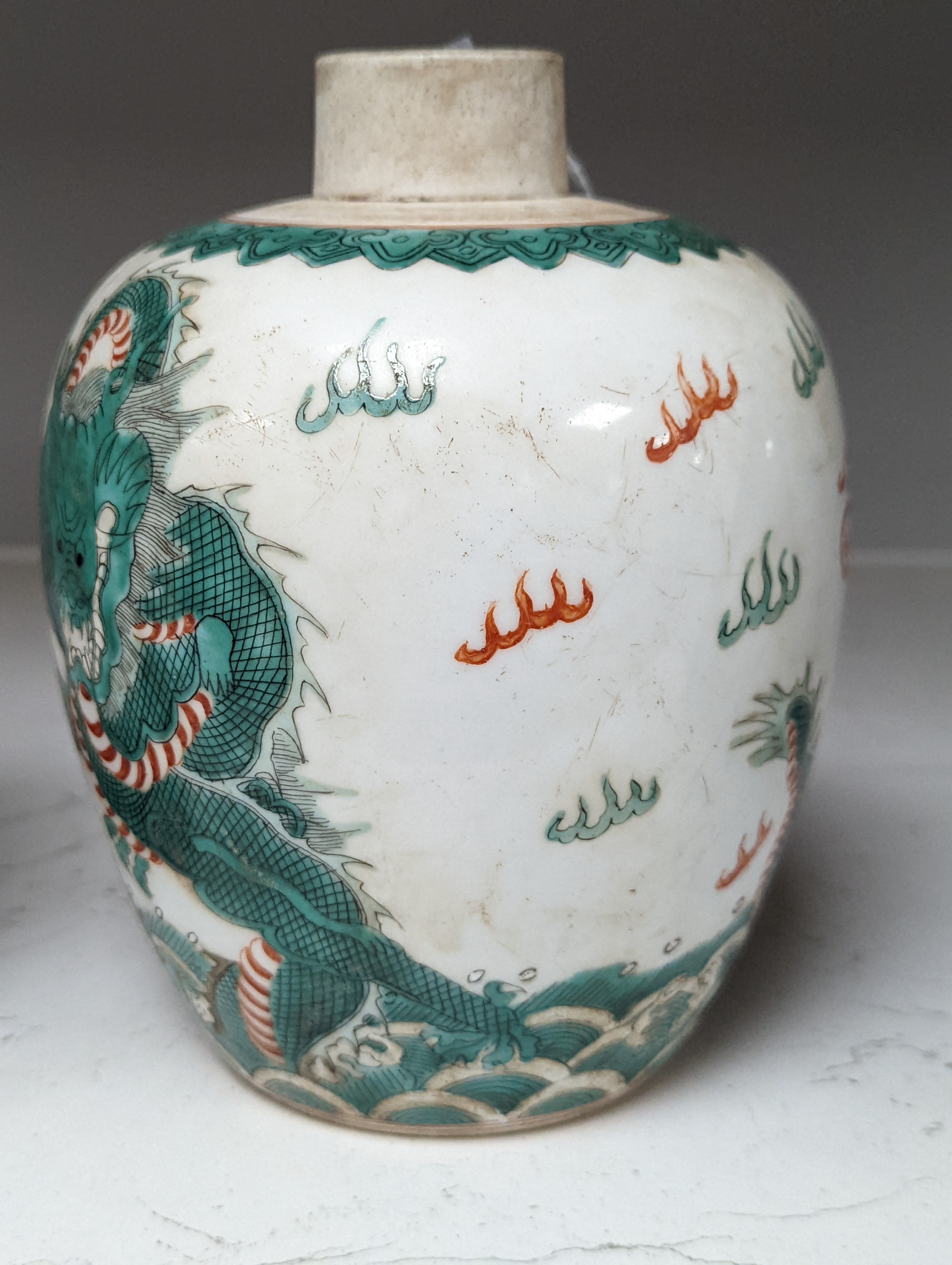 A Chinese enamelled porcelain ‘dragon’ jar 16cm